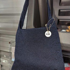 "the Sak" blue knitted purse